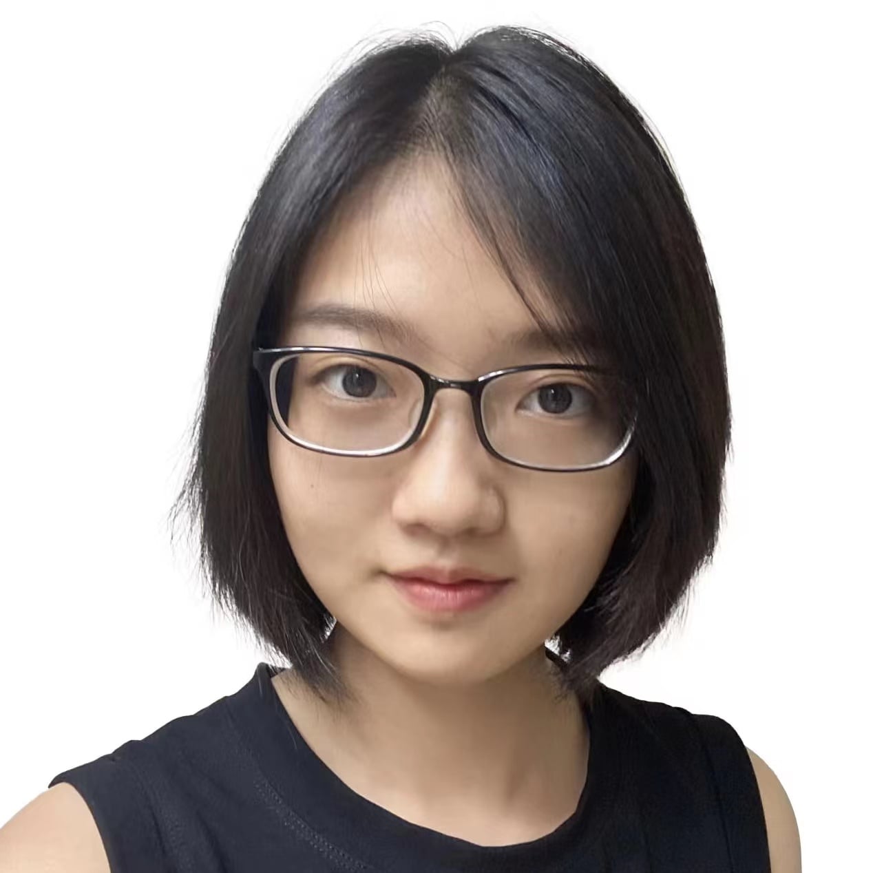Headshot of a young East Asian woman with short dark hair and glasses, wearing a black top, looking directly at the camera.