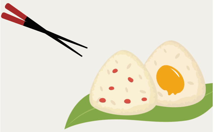 Two triangular rice dumplings (one with red specks, one with an orange filling) on a green leaf, with red and black chopsticks.